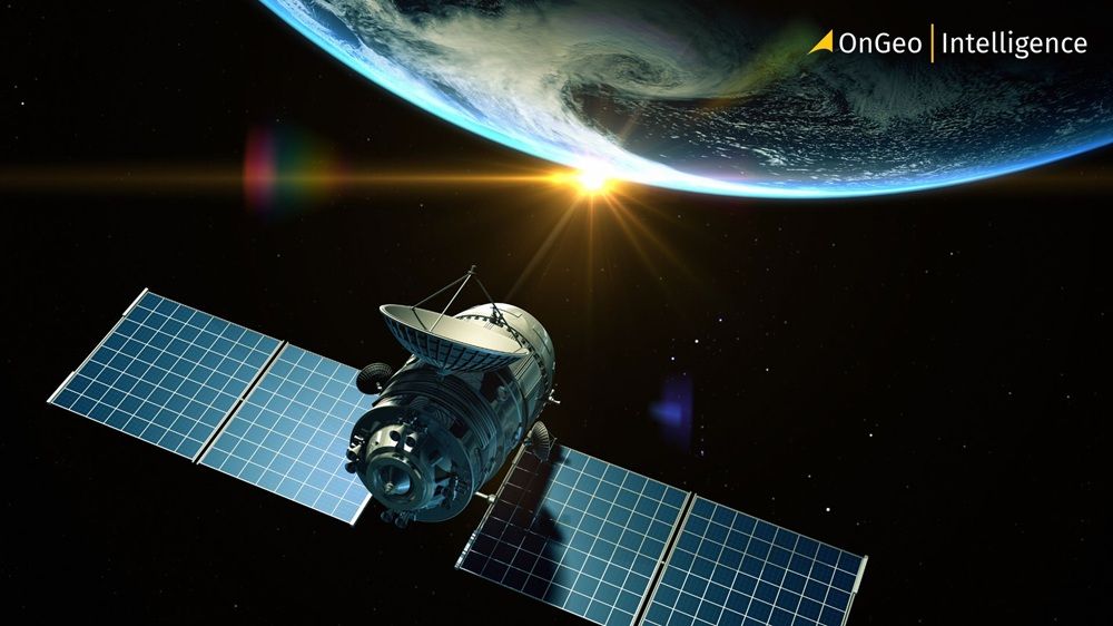 An observation satellite orbiting the Earth, with the blue planet in the background.